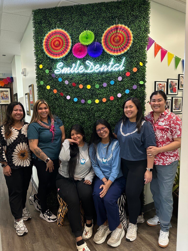 The Smile Dental Center team together at the practice
