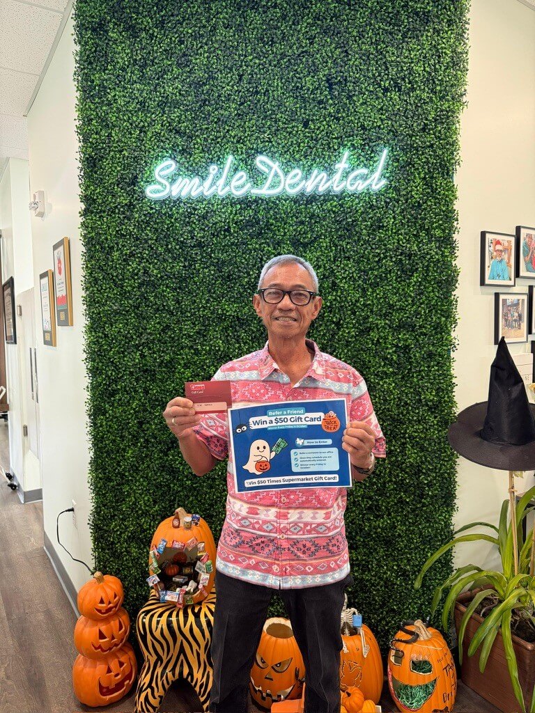 Patient gift-card winner at Smile Dental Center