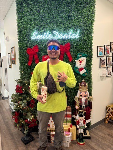 Patient at Smile Dental Center's holiday giveaway