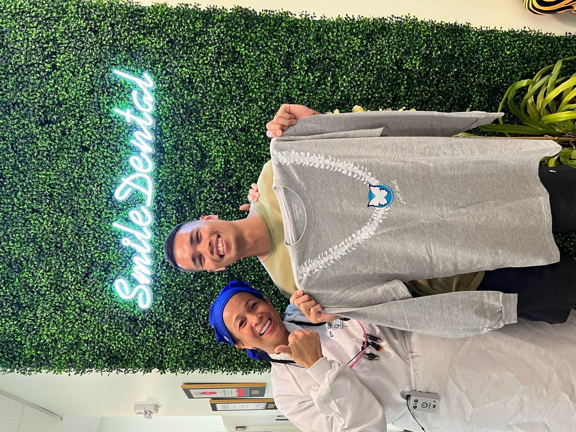 Patients with the team outside Smile Dental Center