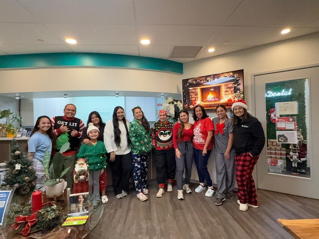 The Smile Dental Center team and families celebrating the holidays