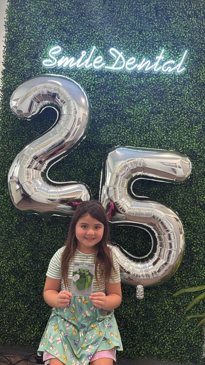 Young patient at Smile Dental Center's 25th anniversary
