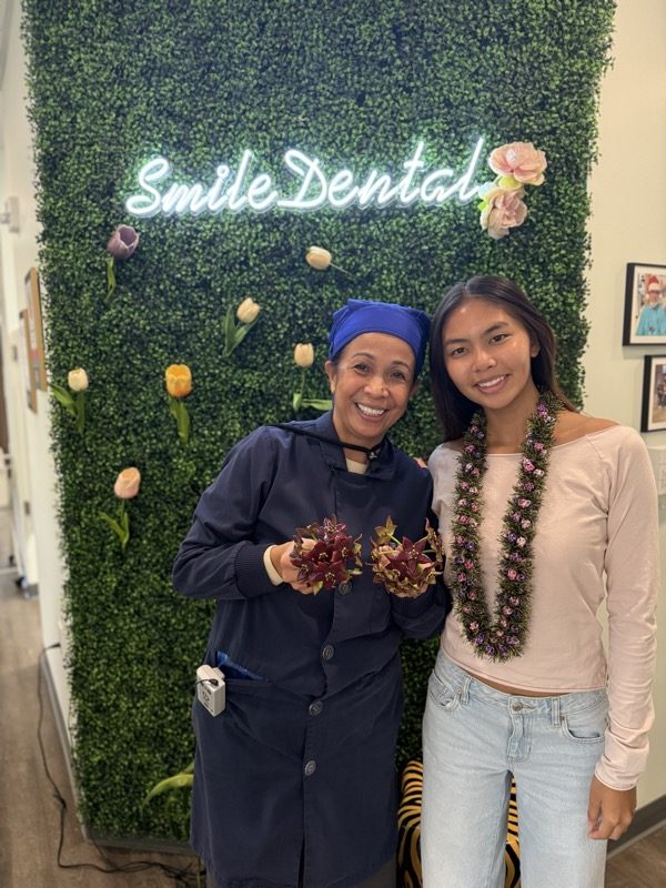 Our team wearing fresh flower leis
